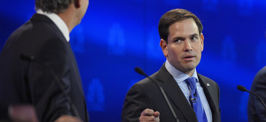 Florida Sen. Marco Rubio, right, counter-attcked former Florida Gov. Jeb Bush, who is fading in the polls, during the CNBC Republican presidential debate, Wed., Oct. 28, 2015, in Boulder, Colo.
