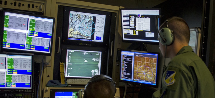 Student sensor operators from the 6th Reconnaissance Squadron practice tactical operations during an MQ-1 Predator simulator mission.