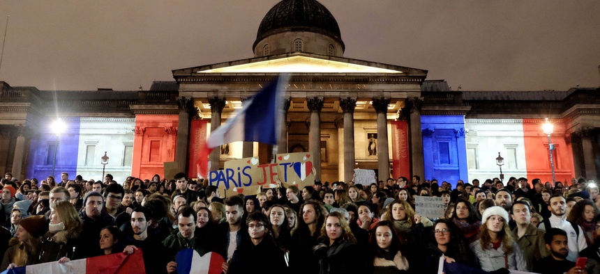 The French community of London hold a vigil at Trafalgar Square in memory of those killed in the terrorist attacks in Paris, France on Nov. 13, 2015.