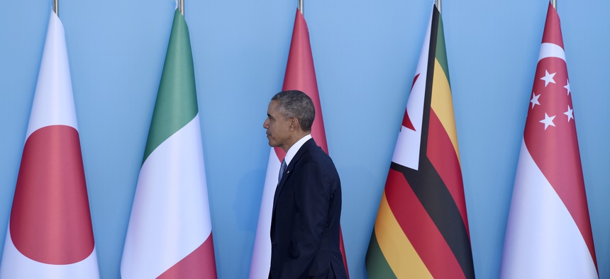 U.S President Barack Obama arrives for the official welcome to the G-20 Summit in Antalya, Turkey, Sunday, Nov. 15, 2015.