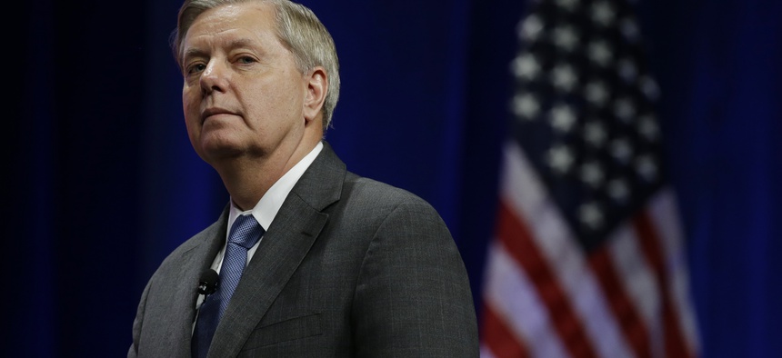 Republican presidential candidate, U.S. Senator Lindsey Graham, R-SC, pauses during his remarks at the Sunshine Summit in Orlando, Fla., Friday Nov. 13, 2015.