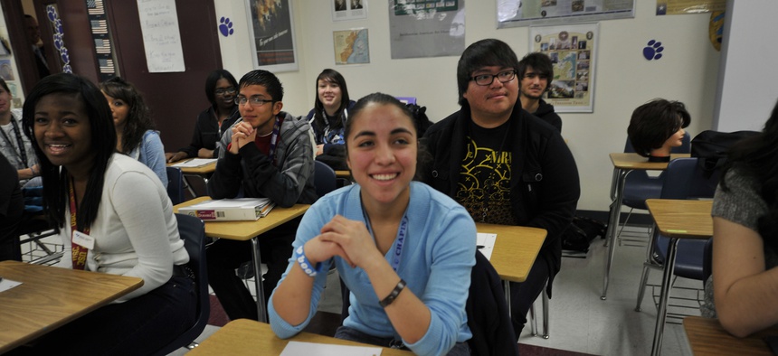 Students listen to Secretary of Defense Leon Panetta teach their national security class, in El Paso, Texas, Friday, Jan. 13, 2012.