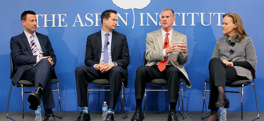 Retired Gen. Stanley McChrystal, center right, at a panel discussion on national service with Rep. Seth Moulton (center left) and Michele Flournoy (right) of the Center for a New American Security. Kevin Baron, far left, of Defense One moderated.