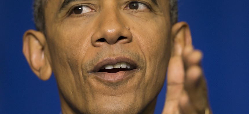 U.S. President Barack Obama speaks during a news conference at the Organization for Economic Cooperation and Development Centre, in Paris, on Tuesday, Dec. 1, 2015.