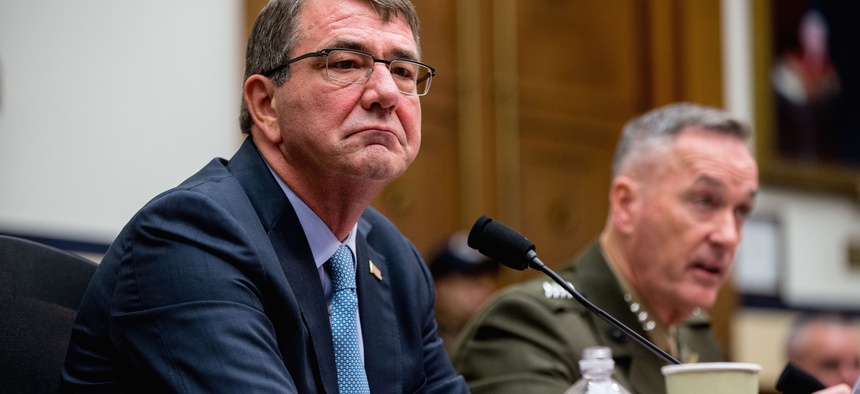 Joint Chiefs Chairman Gen. Joseph Dunford Jr. accompanied by Defense Secretary Ash Carter, testifies on Capitol Hill in Washington, Tuesday, Dec. 1, 2015.