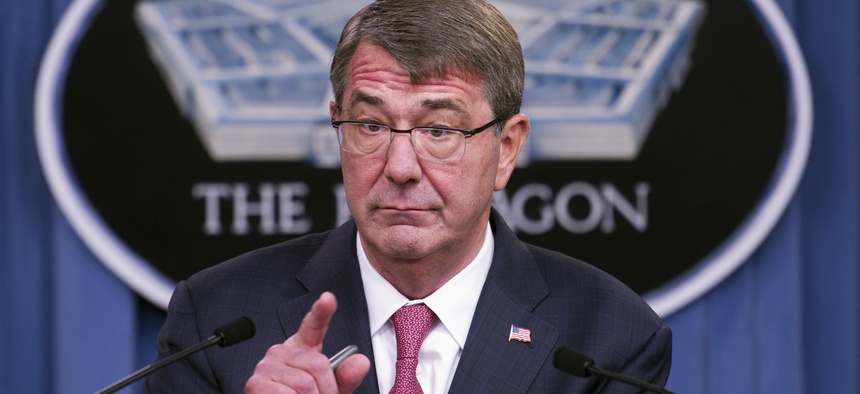Defense Secretary Ash Carter gestures during a news conference at the Pentagon, Thursday, Dec. 3, 2015, to announce that he has ordered the military to open all combat jobs to women.