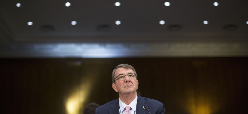 Defense Secretary Ash Carter arrives on Capitol Hill in Washington, Wednesday, Dec. 9, 2015, to testify before the Senate Armed Service Committee hearing on the Islamic State.