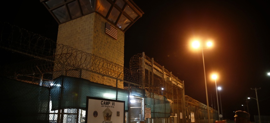 In this image reviewed by the U.S. military, the entrance to Camp VI detention facility is guarded at Guantanamo Bay Naval Base, Cuba, Wednesday, Nov. 20, 2013.