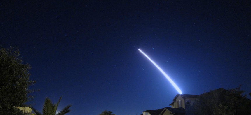 An operational test launch of an unarmed Minuteman III intercontinental ballistic missile from Vandenberg Air Force Base, Calif., is seen from nearby Lompoc, Calif., Sept. 26, 2013.