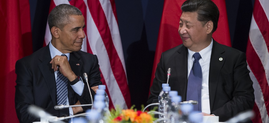 President Barack Obama, left, meets with Chinese President Xi Jinping during the COP21, United Nations Climate Change Conference, in Le Bourget, outside Paris, on Monday, Nov. 30, 2015.