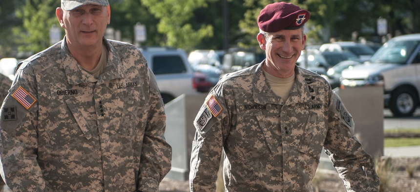 John W. Nicholson Jr., right, then the major general in command of the 82nd Airborne Division, walks with Army Chief of Staff, Gen. Ray Odierno at Fort Bragg, N.C., in this 2014 photo.