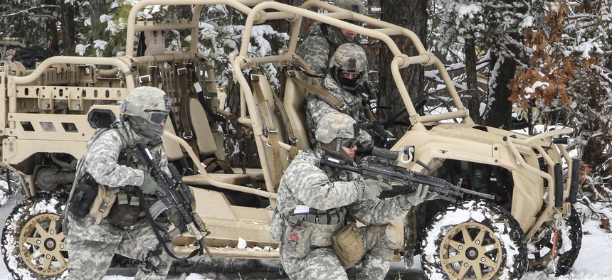 U.S. Army paratroopers assigned to 82nd Airborne Division practice a tactical halt with their brigade’s new Light Tactical All Terrain Vehicle on Fort Pickett, Va., on Feb. 26, 2015.