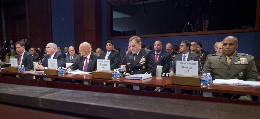 FBI Director James Comey, CIA Director John Brennan, DNI James Clapper, Director of the NSA Adm. Michael Rodgers, and DISA Director Lt. Gen. Vincent Stewart testify at a Capitol Hill hearing on cyber threats, Sept. 10, 2015.