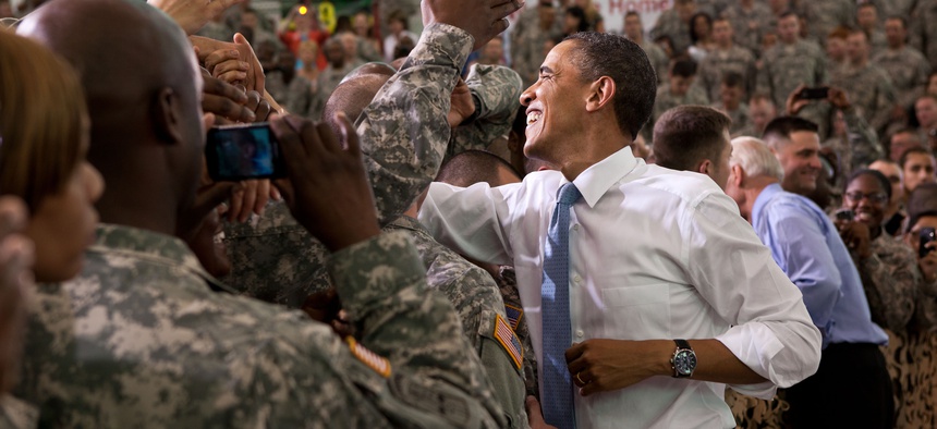 President Barack Obama and Vice President Joe Biden shake hands with the troops following the President's remarks at Fort Campbell, Ky., May 6, 2011.