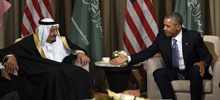 U.S President Barack Obama reaches out to shake hands with King Salman of Saudi Arabia at the G-20 Summit in Antalya, Turkey, Sunday, Nov. 15, 2015.