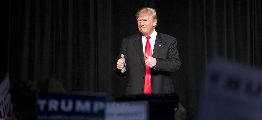 Republican presidential candidate Donald Trump steps on stage to speak at a campaign event Sunday, Feb. 21, 2016, in Atlanta.