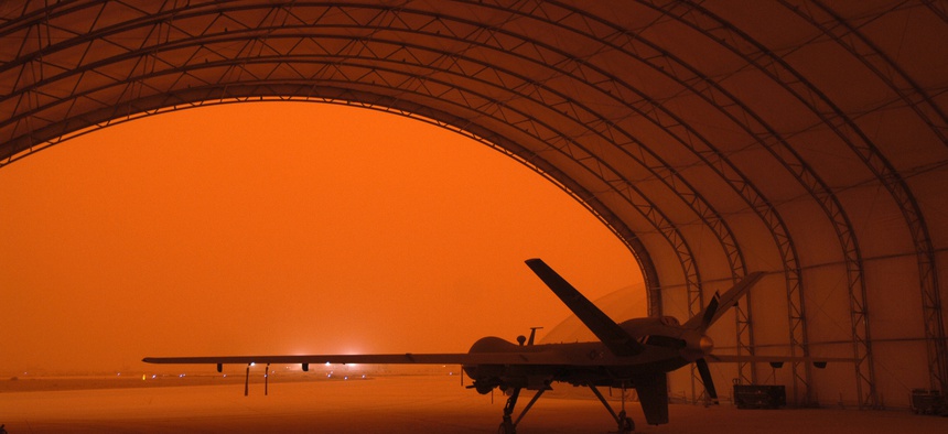An MQ-9 Reaper sits in a hanger during a sandstorm at Joint Base Balad, Iraq, Sept. 15, 2008.