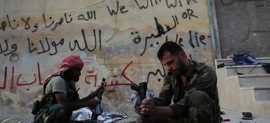 Free Syrian Army rebels clean their weapons in Aleppo, Syria, in this file photo from 2012.