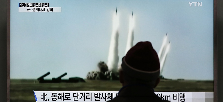 A man watches a TV screen showing a file footage of the missile launch conducted by North Korea, at Seoul Railway Station in Seoul, South Korea, Monday, March 21, 2016. North Korea fired short-range projectiles into the sea on Monday, Seoul said.
