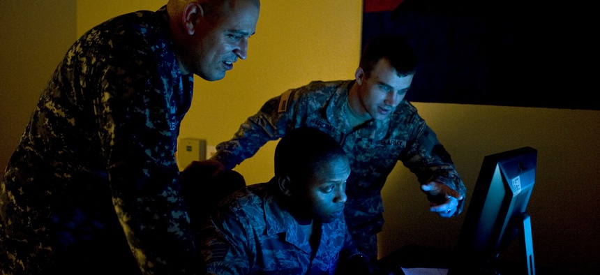 U.S. Navy Petty Officer 1st Class Joel Melendez, Naval Network Warfare Command information systems analysis.