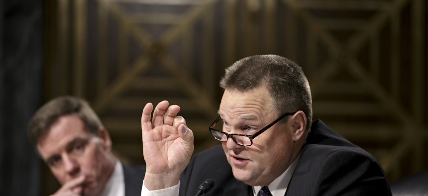Sen. Jon Tester, D-Mont., Thursday, Nov. 14, 2013, on Capitol Hill in Washington.