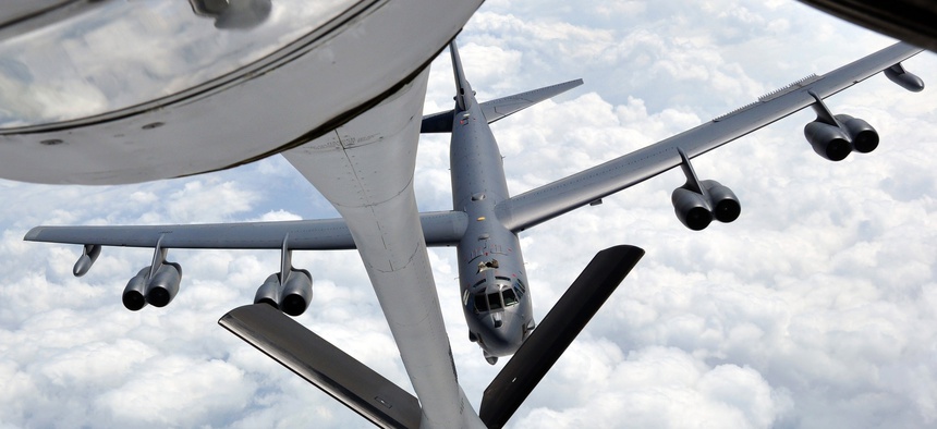 A B-52 Stratofortress approaches a KC-135 Stratotanker during an air refueling training exercise on May 12, 2014.