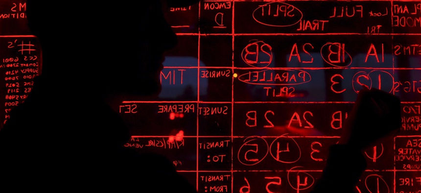 A U.S. sailor updates the status board on the pilot house aboard the guided-missile destroyer USS Roosevelt (DDG 80) in the Atlantic Ocean, March 25, 2016.
