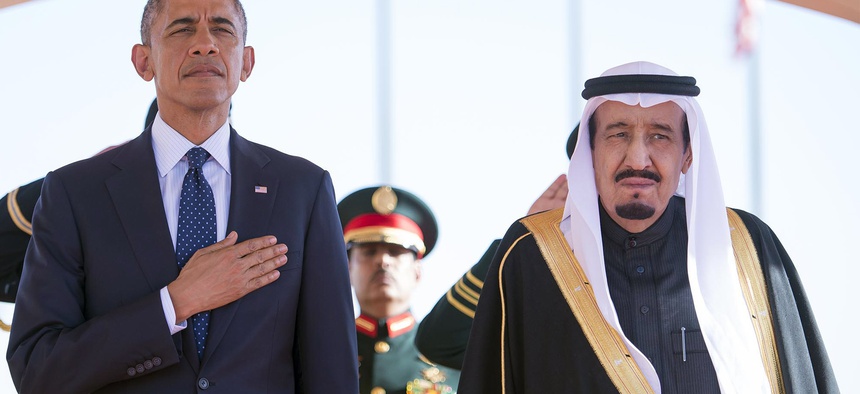 In this Tuesday, Jan. 27, 2015 photo provided by the Saudi Press Agency, President Barack Obama and Saudi Arabian King Salman bin Abdul Aziz stand during the arrival ceremony in Riyadh, Saudi Arabia, Tuesday, Jan. 27, 2015.