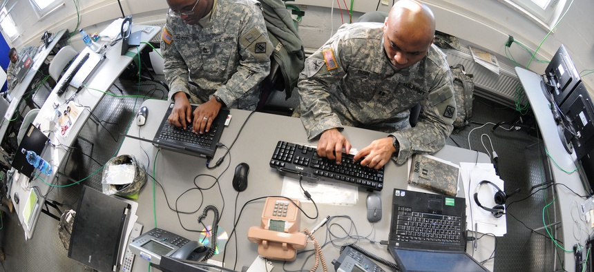 Soldiers from the 2nd Signal Brigade complete a mission in the Joint Cyber Control Center in Grafenwoehr, Germany, Feb. 23, 2011