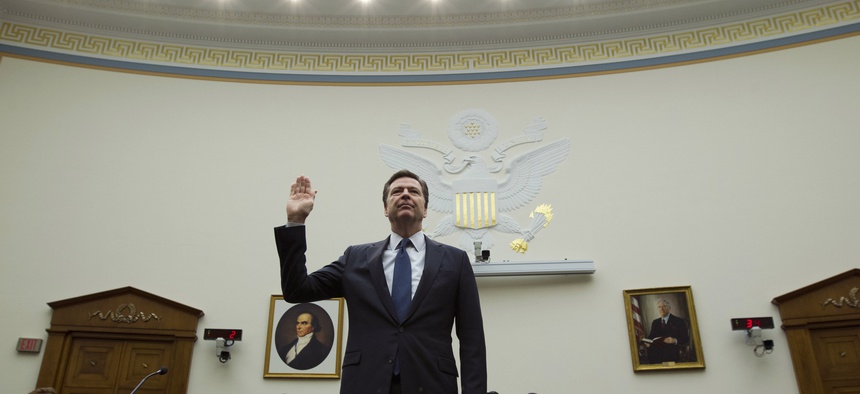 FBI Director James Comey is sworn in on Capitol Hill in Washington, Tuesday, March 1, 2016, prior to testifying before the House Judiciary Committee.
