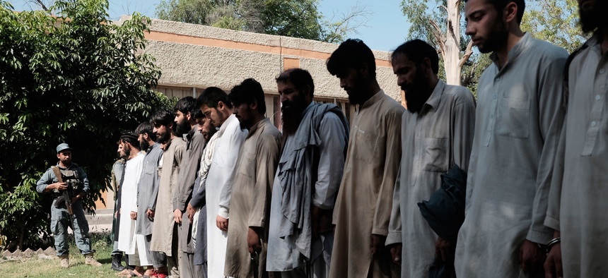 Islamic State fighters, who were arrested by Afghan security personal are presented to the media at the Afghan police headquarters in Jalalabad, east of Kabul, Afghanistan, Monday, May 9, 2016.