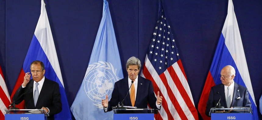 Russian Foreign Minister Sergei Lavrov, left, U.S. Secretary of State John Kerry, center, and and United Nations special envoy on Syria Staffan de Mistura, during Syria talks in Vienna, May 17, 2016.