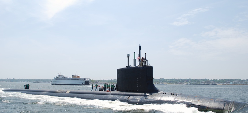 The Virginia-class attack submarine USS New Mexico transits the Thames River to her new home port at Naval Submarine Base New London, Connecticut, in June 2010.