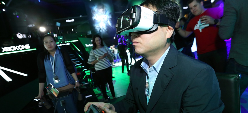 Gamers experience "Minecraft" with Oculus VR at the Xbox Media Showcase at E3 2016 in Los Angeles on Monday, June 13, 2016.
