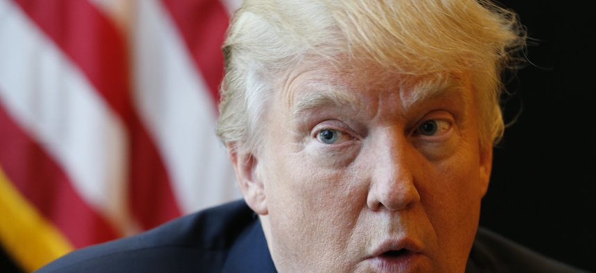 n this Monday, July 11, 2016 file photo, Republican Presidential candidate Donald Trump answers a question during an interview after a rally in Virginia Beach, Va., Monday, July 11, 2016.