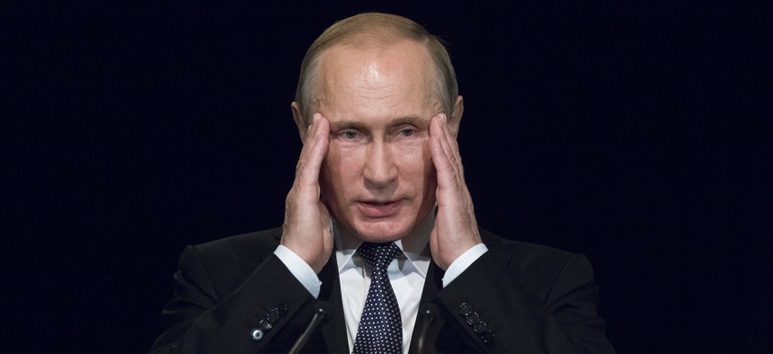 Russian President Vladimir Putin gestures as he addresses students during his visit to German Embassy school in Moscow, Russia, Wednesday, June 29, 2016.