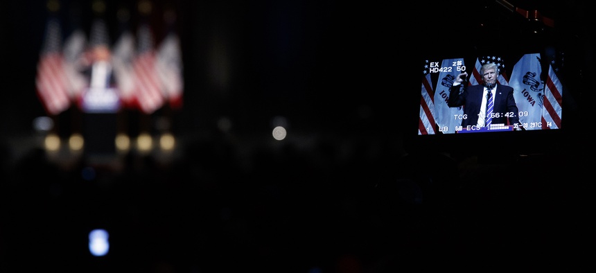 Republican presidential candidate Donald Trump is shown on a monitor as he speaks during a campaign rally Thursday, July 28, 2016, in Davenport, Iowa.