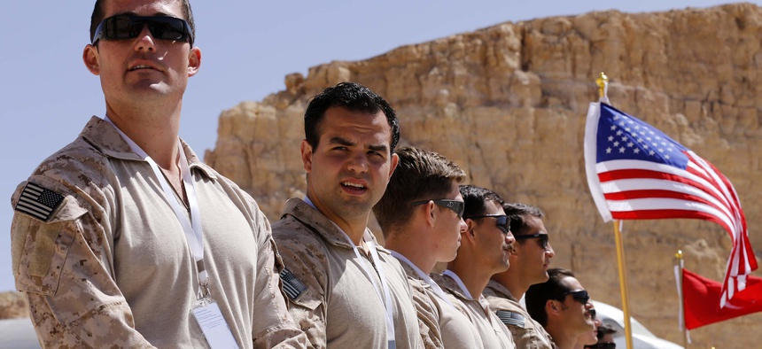 Members of the U.S. military team wait to compete during the 7th Annual International Warrior Competition hosted by the King Abduallh Special Operations Training Center (KASOTC), Sunday, April 19, 2015, Amman, Jordan.