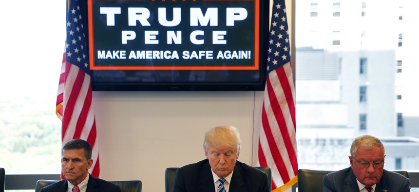 Donald Trump received his first classified intelligence briefing Wednesday. He also held a national security roundtable at Trump Towers with retired Lt. Gen. Mike Flynn, left, and Ret. Army Lt. Gen. Keith Kellogg, right, Wed. Aug. 17, 2016.
