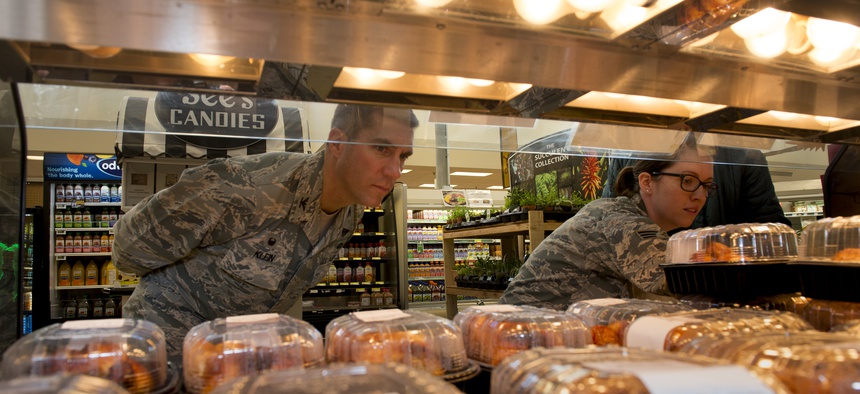 U.S. Airmen conduct a public health inspection at the Travis AFB Commissary, Aug 5, 2016, Travis AFB, Calif.