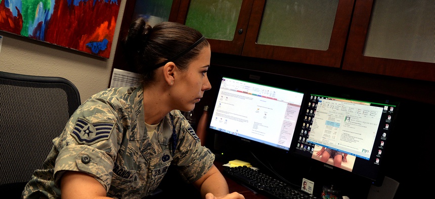 A U.S. Air Force noncommissioned officer works at her desk at Goodfellow Air Force Base, Texas, June 17, 2016.