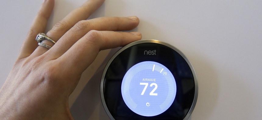 The Nest Learning Thermostat is on display following a news conference Wednesday, June 17, 2015, in San Francisco.