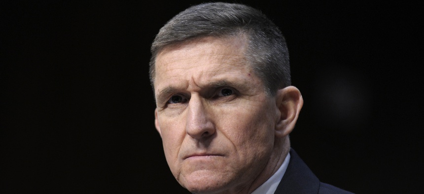 Defense Intelligence Agency Director Lt. Gen. Michael Flynn listens on Capitol Hill in Washington, Tuesday, March 12, 2013, during the Senate Intelligence Committee hearing on worldwide threats.