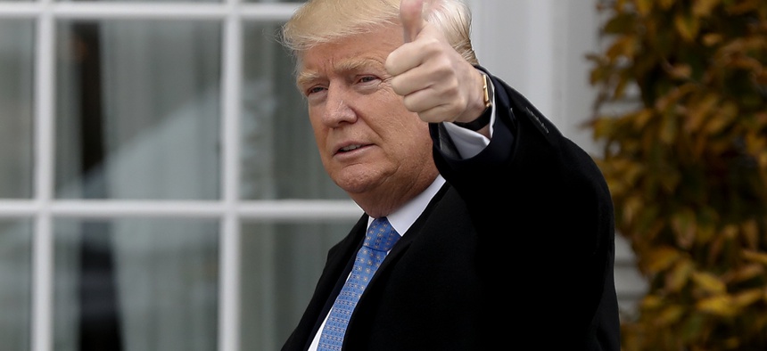 President-elect Donald Trump gives the thumbs up as he arrives at the Trump National Golf Club Bedminster clubhouse, Sunday, Nov. 20, 2016 in Bedminster, N.J..