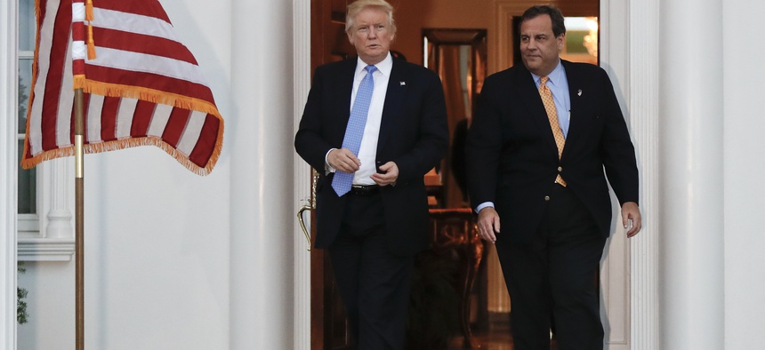 President-elect Donald Trump, left, and New Jersey Gov. Chris Christie walk from Trump National Golf Club Bedminster clubhouse, Sunday, Nov. 20, 2016, in Bedminster, N.J., after meeting.