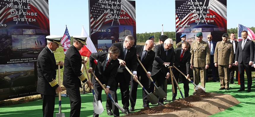 U.S. and Polish officials symbolically break ground for construction of the U.S.-led missile defense site in northern Poland in May.