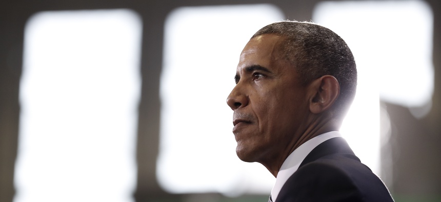 President Barack Obama pauses as he speaks at MacDill Air Force Base in Tampa, Fla., Tuesday, Dec. 6, 2016, about the administration's approach to counterterrorism campaign.
