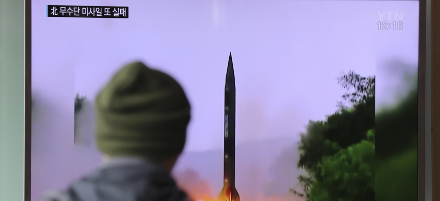A man watches a TV news program showing a file image of missile launch conducted by North Korea, at the Seoul Railway Station in Seoul, South Korea, Thursday, Oct. 20, 2016.