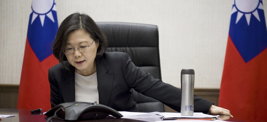 Taiwan's President Tsai Ing-wen speaks with U.S. President-elect Donald Trump through a speaker phone in Taipei, Taiwan, Dec. 2, 2016.