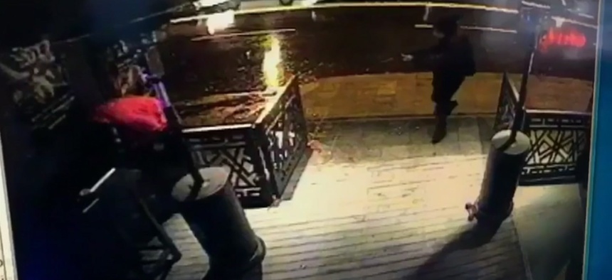 This image taken from CCTV provided by Haberturk Newspaper Sunday Jan. 1, 2017 shows the attacker, armed with a long-barrelled weapon, shooting his way into the Reina nightclub in Istanbul, Turkey on Sunday morning.